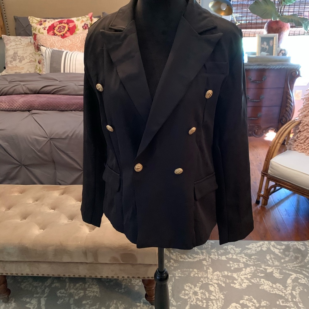 Black Jacket lined....marked L, I wear a 10-12